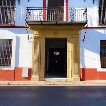 Acogedor En *